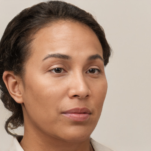 Neutral white young-adult female with short  brown hair and brown eyes