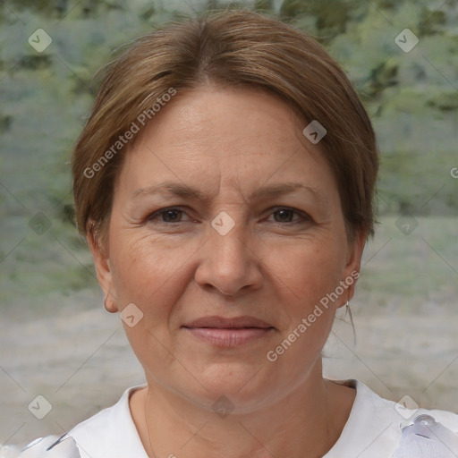 Joyful white adult female with short  brown hair and brown eyes