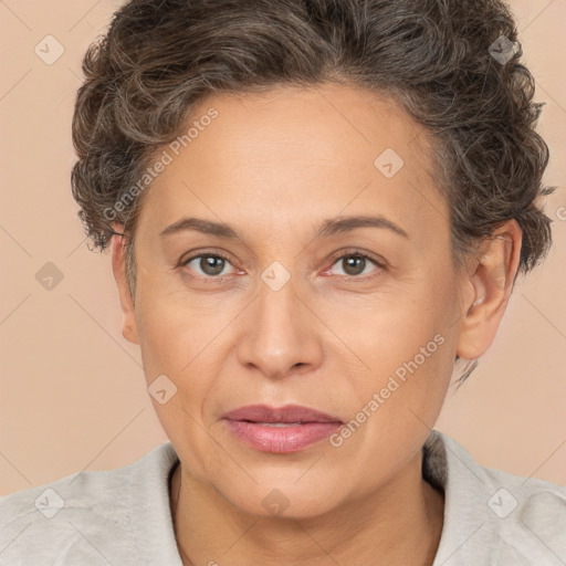 Joyful white adult female with short  brown hair and brown eyes