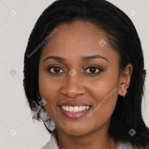 Joyful latino young-adult female with long  black hair and brown eyes