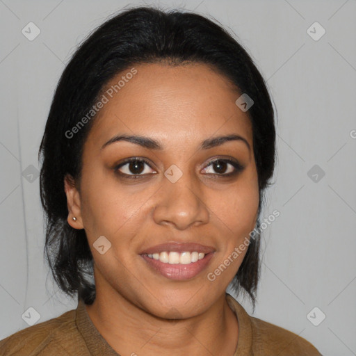 Joyful black young-adult female with medium  brown hair and brown eyes