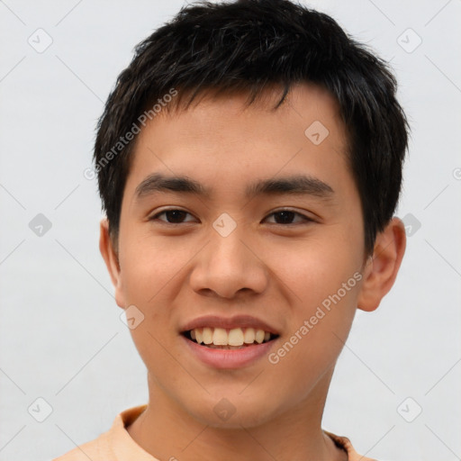 Joyful asian young-adult male with short  brown hair and brown eyes