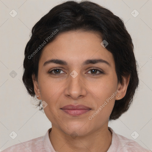 Joyful latino young-adult female with short  brown hair and brown eyes