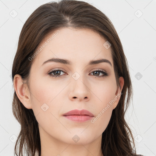 Neutral white young-adult female with long  brown hair and brown eyes