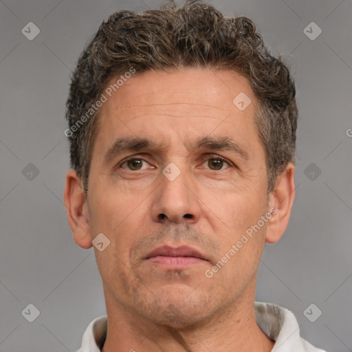 Neutral white adult male with short  brown hair and brown eyes