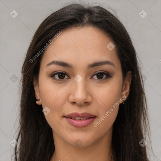 Joyful latino young-adult female with long  brown hair and brown eyes