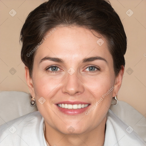 Joyful white young-adult female with short  brown hair and brown eyes