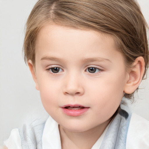 Joyful white child female with medium  brown hair and grey eyes