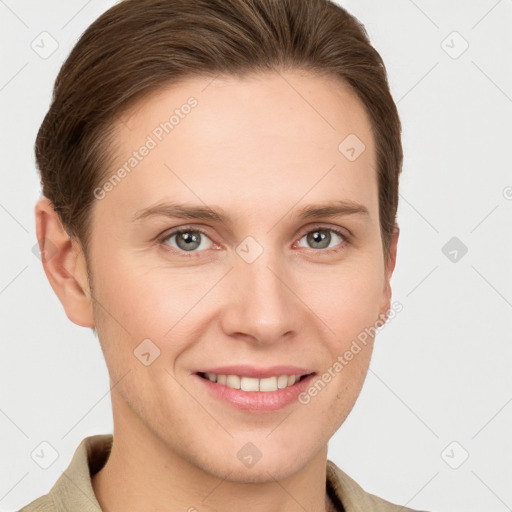 Joyful white young-adult female with short  brown hair and grey eyes