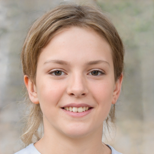 Joyful white child female with medium  brown hair and brown eyes