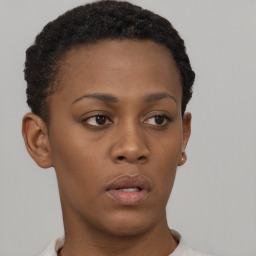 Neutral black young-adult female with short  brown hair and brown eyes