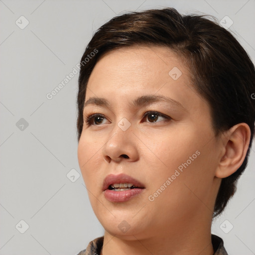 Joyful white young-adult female with medium  brown hair and brown eyes