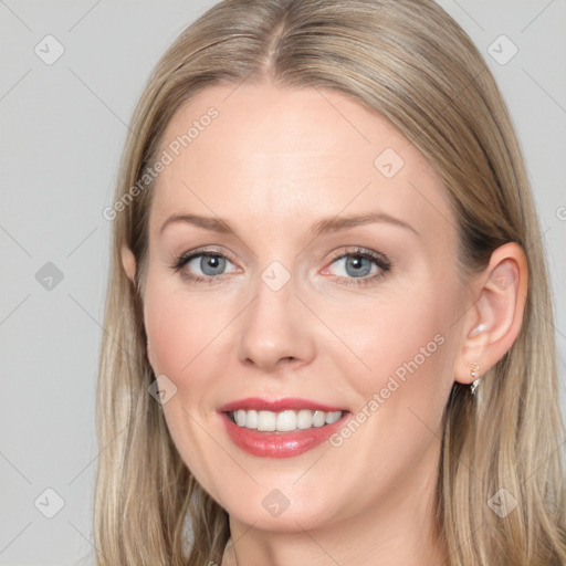 Joyful white young-adult female with long  brown hair and blue eyes