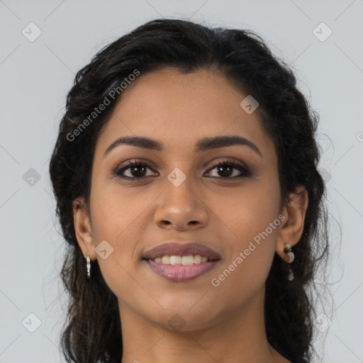 Joyful latino young-adult female with long  brown hair and brown eyes