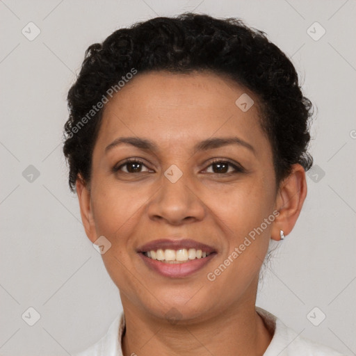 Joyful latino young-adult female with short  brown hair and brown eyes