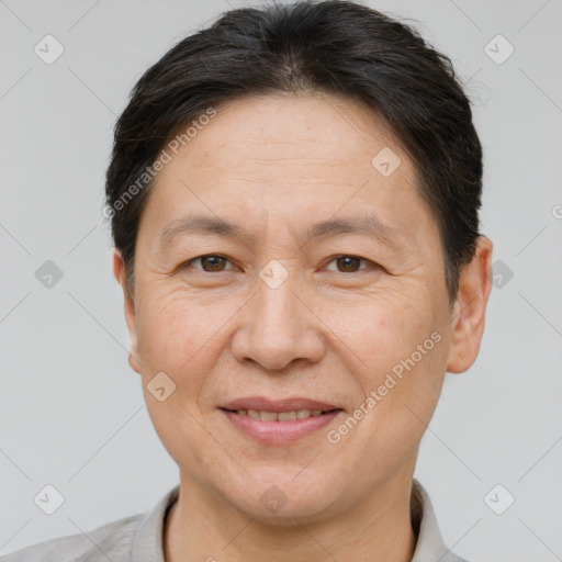 Joyful white adult female with short  brown hair and brown eyes