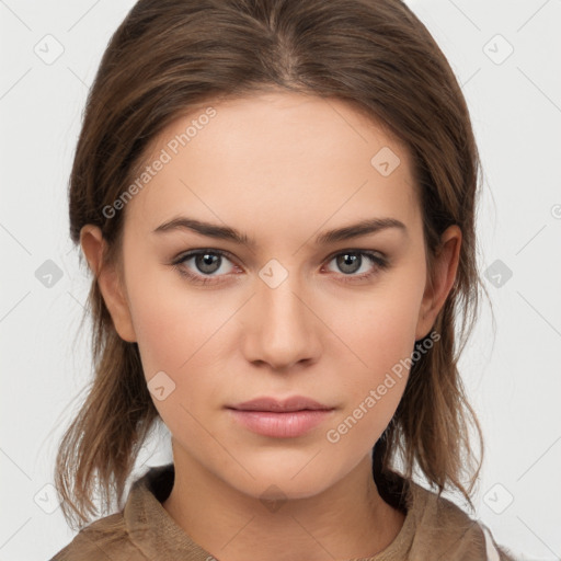 Neutral white young-adult female with medium  brown hair and brown eyes