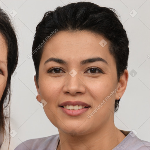 Joyful latino young-adult female with short  brown hair and brown eyes