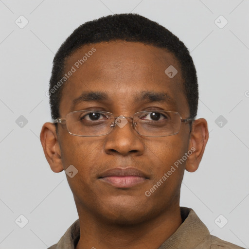 Neutral black young-adult male with short  black hair and brown eyes
