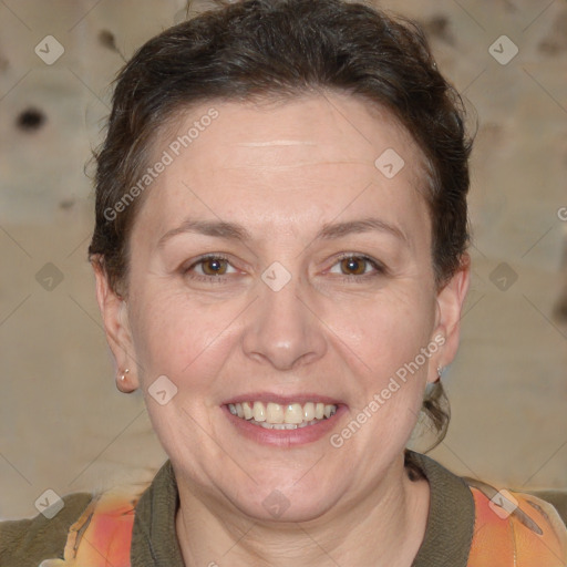 Joyful white adult female with short  brown hair and brown eyes