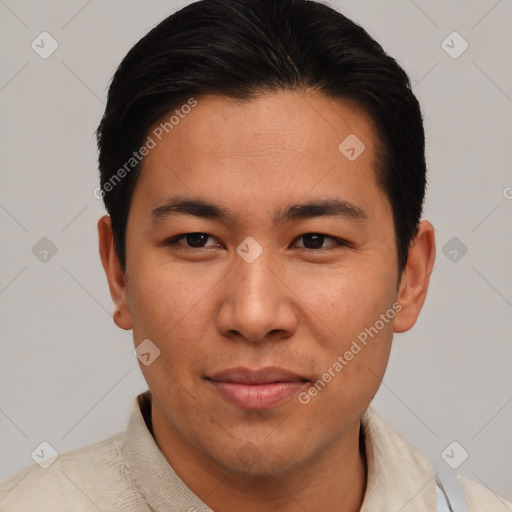 Joyful asian young-adult male with short  brown hair and brown eyes