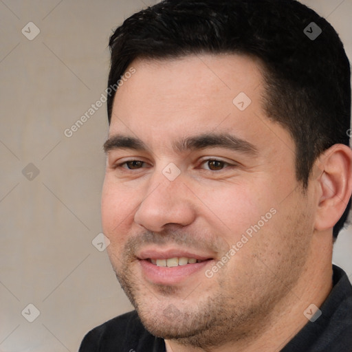 Joyful white young-adult male with short  black hair and brown eyes