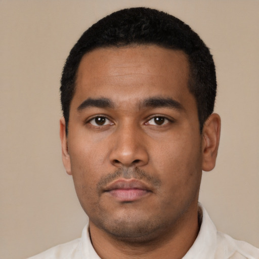 Neutral latino young-adult male with short  black hair and brown eyes