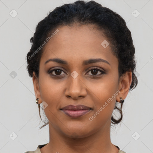 Joyful latino young-adult female with short  black hair and brown eyes