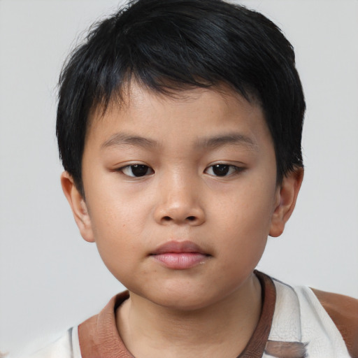 Neutral asian child male with short  brown hair and brown eyes