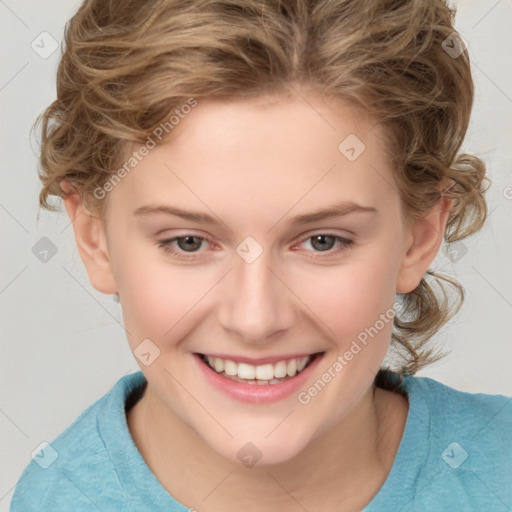 Joyful white child female with medium  brown hair and brown eyes