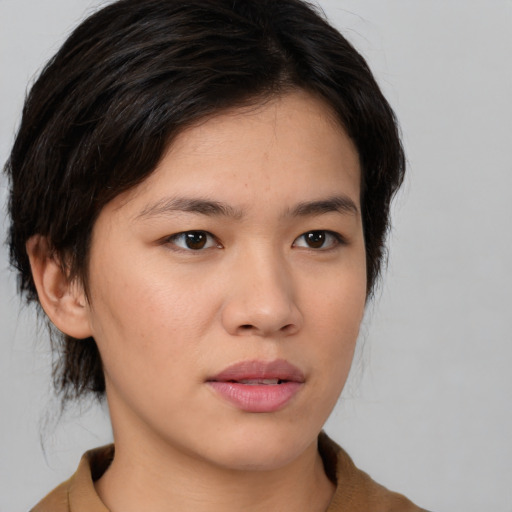 Neutral asian young-adult female with medium  brown hair and brown eyes