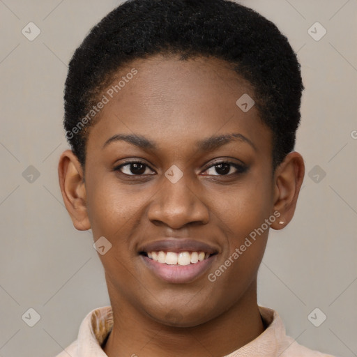 Joyful black young-adult female with short  brown hair and brown eyes