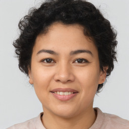 Joyful asian young-adult female with short  brown hair and brown eyes