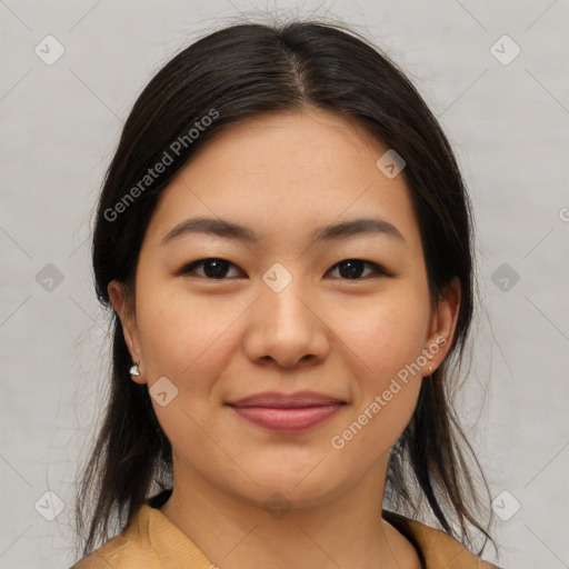 Joyful asian young-adult female with medium  brown hair and brown eyes