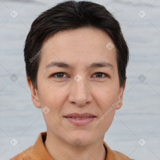 Joyful white adult female with short  brown hair and brown eyes