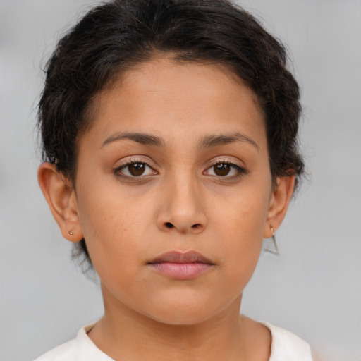 Neutral latino young-adult female with short  brown hair and brown eyes