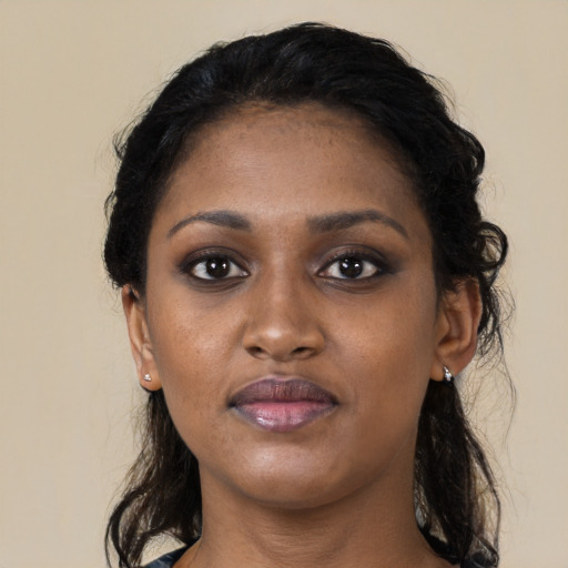 Neutral black young-adult female with long  black hair and brown eyes