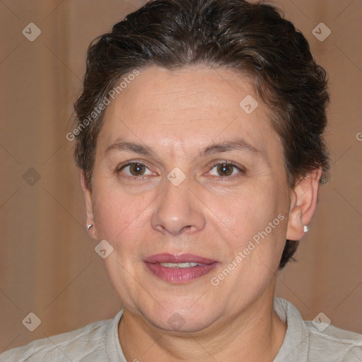 Joyful white adult female with short  brown hair and brown eyes