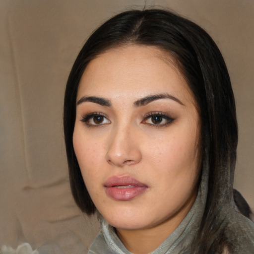 Neutral white young-adult female with medium  black hair and brown eyes