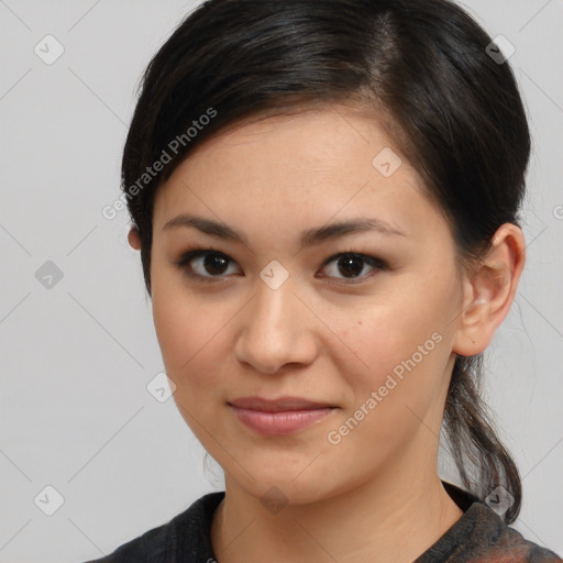 Joyful latino young-adult female with medium  brown hair and brown eyes