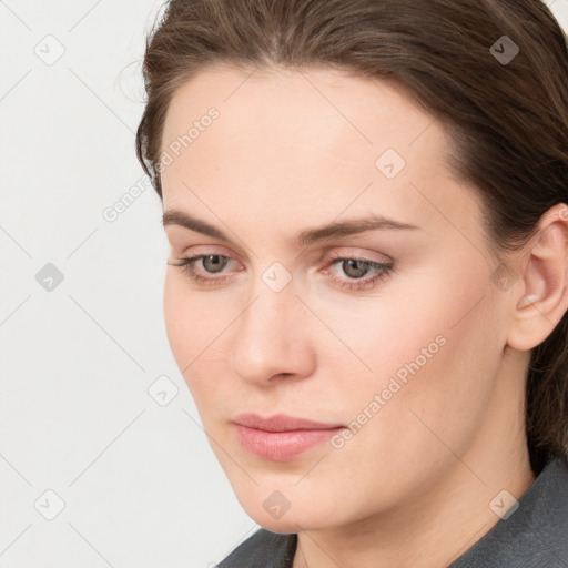 Neutral white young-adult female with medium  brown hair and grey eyes