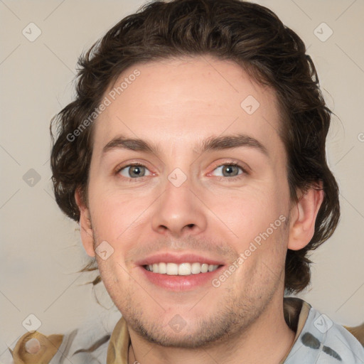 Joyful white young-adult male with medium  brown hair and brown eyes