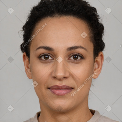 Joyful latino young-adult female with short  brown hair and brown eyes