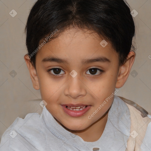 Joyful white child female with short  brown hair and brown eyes