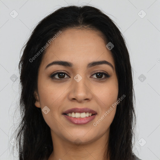 Joyful latino young-adult female with long  brown hair and brown eyes