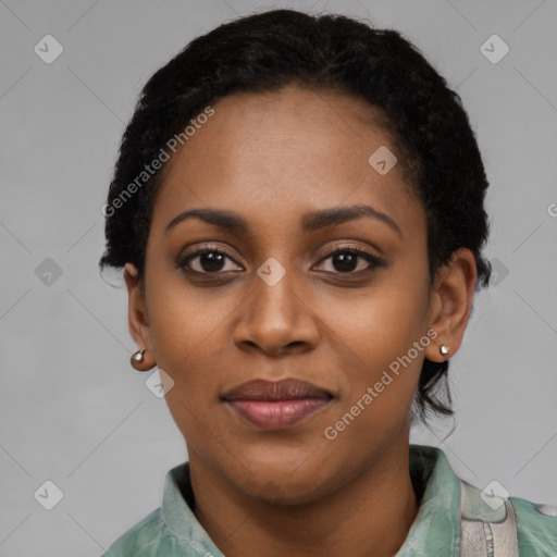 Joyful latino young-adult female with short  black hair and brown eyes