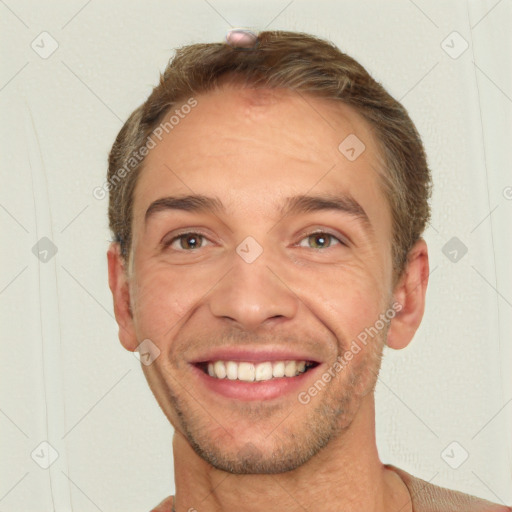 Joyful white young-adult male with short  brown hair and brown eyes