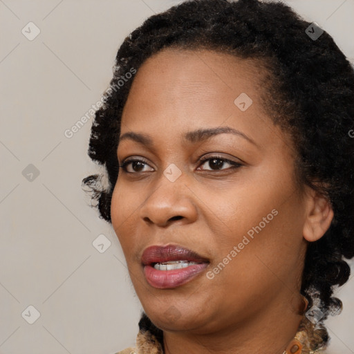 Joyful black young-adult female with medium  black hair and brown eyes