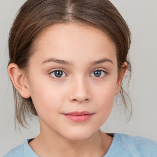 Joyful white child female with medium  brown hair and brown eyes