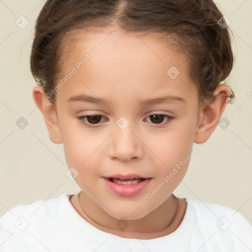 Joyful white child female with short  brown hair and brown eyes